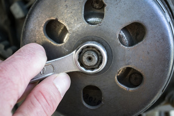 Automobile repair. Repairman working.