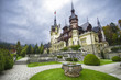 Beautiful Peles castle and ornamental garden in Sinaia, Romania landmark of Carpathian mountains in Romania. Former Home Of The Romanian Royal Family.