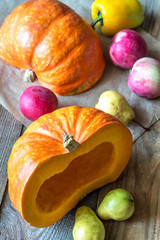 Sticker - Pumpkin with fruits on the wooden background