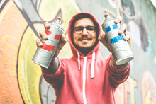 Young Happy Man Drawing With Two Smiling Sprays
