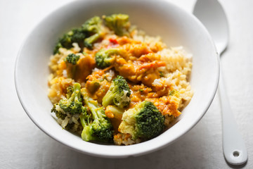 Wall Mural - Curry with broccoli, red pepper and rice