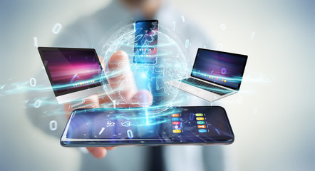 Modern devices connected in businessman hand 3D rendering