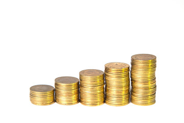 Golden coin stacks isolated on white background.