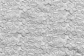 White lace with small flowers. No any trademark or restrict matter in this photo.