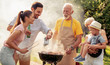 © ivanko80 - Family having a barbecue party in their garden in summer