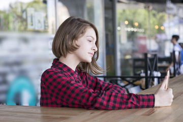 Pretty lady enjoying device