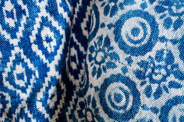 Two different blue and white patterned cotton textiles from India