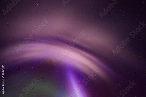 Fotografia, Obraz Aurora Borealis corona and stars overhead in the night sky.