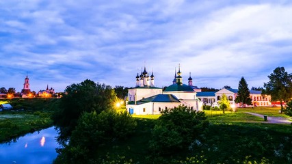 Wall Mural - Suzdal, Russia. Morning view of old houses and churches in Suzdal, Russia during a cloudy morning. Golden tour trip in Russia. Time-lapse at sunrise with nature