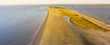 Panorama aerial view famous Texas City Dike, a levee that projects nearly 5miles south-east into mouth of Galveston Bay. It was designed to reduce the impact of sediment accumulation along lower Bay