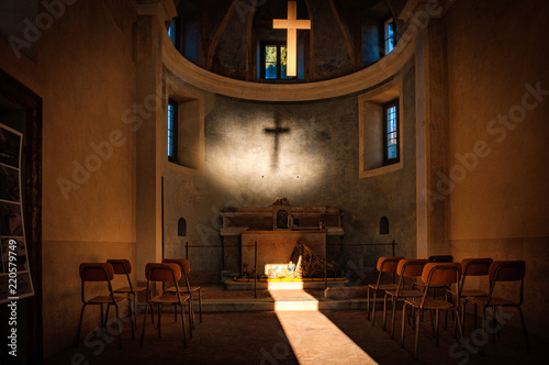 A Cross Projecting A Shadow In A Small Rural Church Set Up