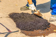 Worker sheltering hole with tar