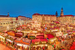 © Feel good studio - Dresden in Christmas time, Germany. Spectacular view on famous traditional European Christmas market on the central city square, dusk scenery, illuminated stalls and market places, amusement park.