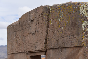 Wall Mural - Close-up of elaborate stone carvings and reliefs on the Puerta de Sol (Gateway of the Sun), at the Tiwanaku archeological site, near La Paz, Bolivia.