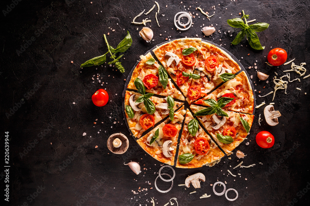Tasty pizza with cherries, onions and mushrooms on a black background - obrazy, fototapety, plakaty 