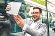 © grki - Businessman using tablet