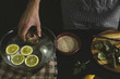 © The Picture Pantry - A man prepares lunch with artichokes