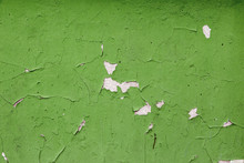 Old Wall With Green Paint Peeling Off As Background
