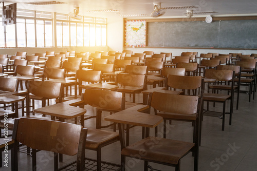 Fotomural Empty classroom with vintage tone wooden chairs