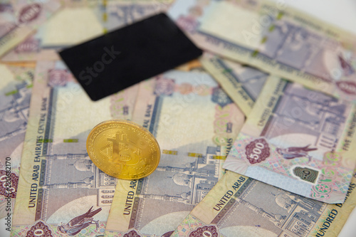 Bitcoin Token On Top Of Dubai Dirham Banknotes Money With Black - 