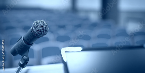 Rostrum With Microphone And Computer In Conference Room