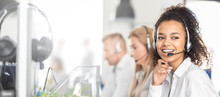 Call Center Worker Accompanied By Her Team.