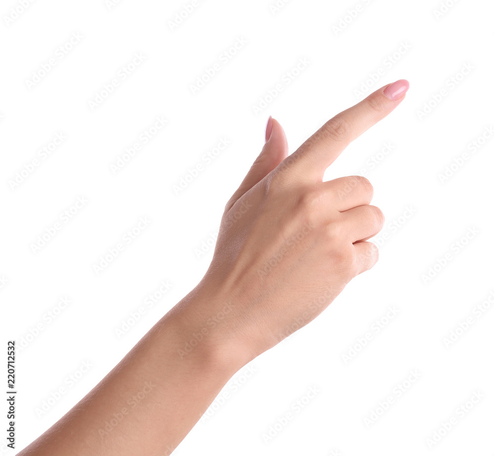 Subtle Pointing Woman pointing to something on white background, closeup Stock Photo ...