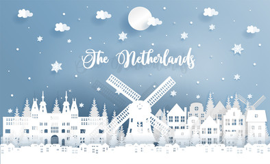 Fototapete - Winter and Christmas in The Netherlands with landmark, city, windmill and falling snow. Paper cut style vector illustration.