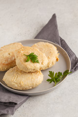 Canvas Print - Steam chicken cutlet on a white plate, white background.