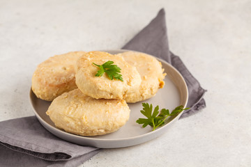 Canvas Print - Steam chicken cutlet on a white plate, white background.