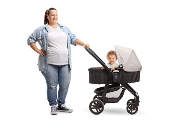 Overweight mother with a stroller and a baby isolated on white