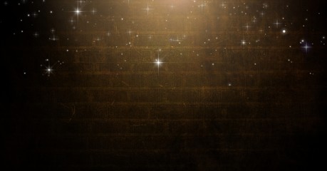 Wall Mural - Stars falling over Vignette and light on brown brick wall