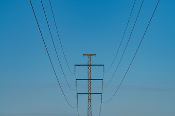 Single power line against a cloudless sky