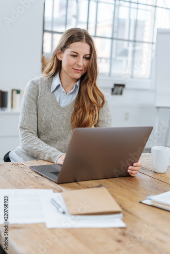 Young Businesswoman Or Student Working At Her Desk Buy This
