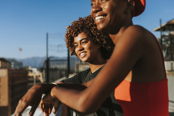 girlfriends hanging out at a la rooftop