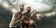 Rugby players emotionally rejoice at victory on professional rugby stadium