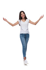 Wall Mural - smiling brunette woman stepping and making a welcoming gesture