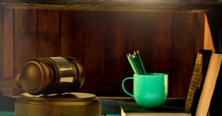 Poster - Gavel and wooden shelf with books and cup