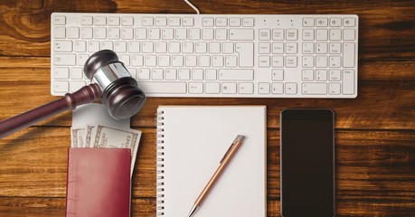 Canvas Print - Gavel on desk with keyboard money and phone