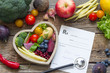 Healthy food in heart stethoscope and medical prescription diet and medicine concept
