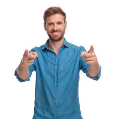 Canvas Print - confident happy casual man is pointing fingers