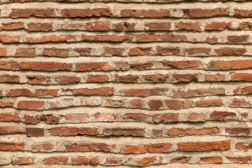 Wall Mural - Irregular Red Brick Wall Background