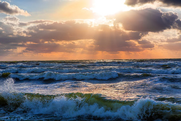 Sticker - sunset in the cloudy sky over the stormy sea