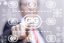 Man Clicks A Gig Economy Words Button On A Virtual Scheme Panel. GIG Economy Business Finance Marketing Concept.