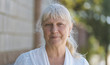 © Vladimir Arndt - Portrait of a beautiful middle-aged woman outdoors. Selective focus.