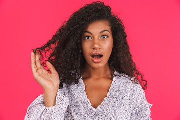 Wall Mural - Portrait of a shocked young african woman