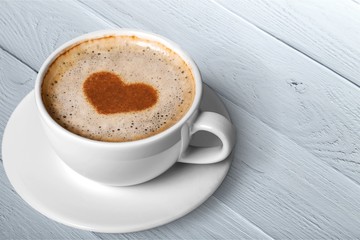 Wall Mural - Latte coffee with heart symbol isolated on white background