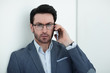 © ASDF - handsome businessman talking on the phone