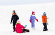 © Syda Productions - childhood, leisure and season concept - group of happy little kids in winter clothes playing outdoors
