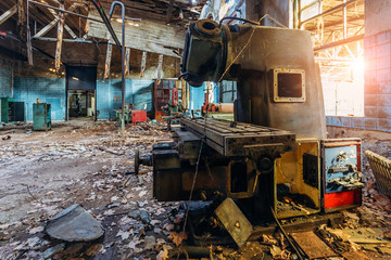 Wall Mural - Old industrial machine tools in workshop. Rusty metal equipment in abandoned factory